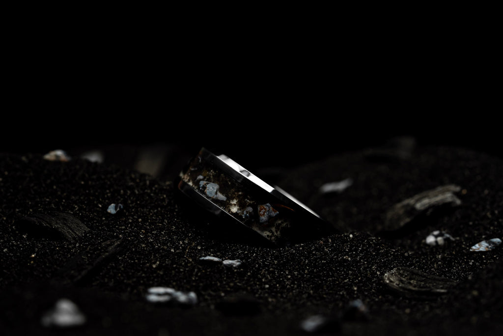 Smoldering Snow | Snowflake Obsidian and Crushed Icelandic Lava with Orange/Red Glow.