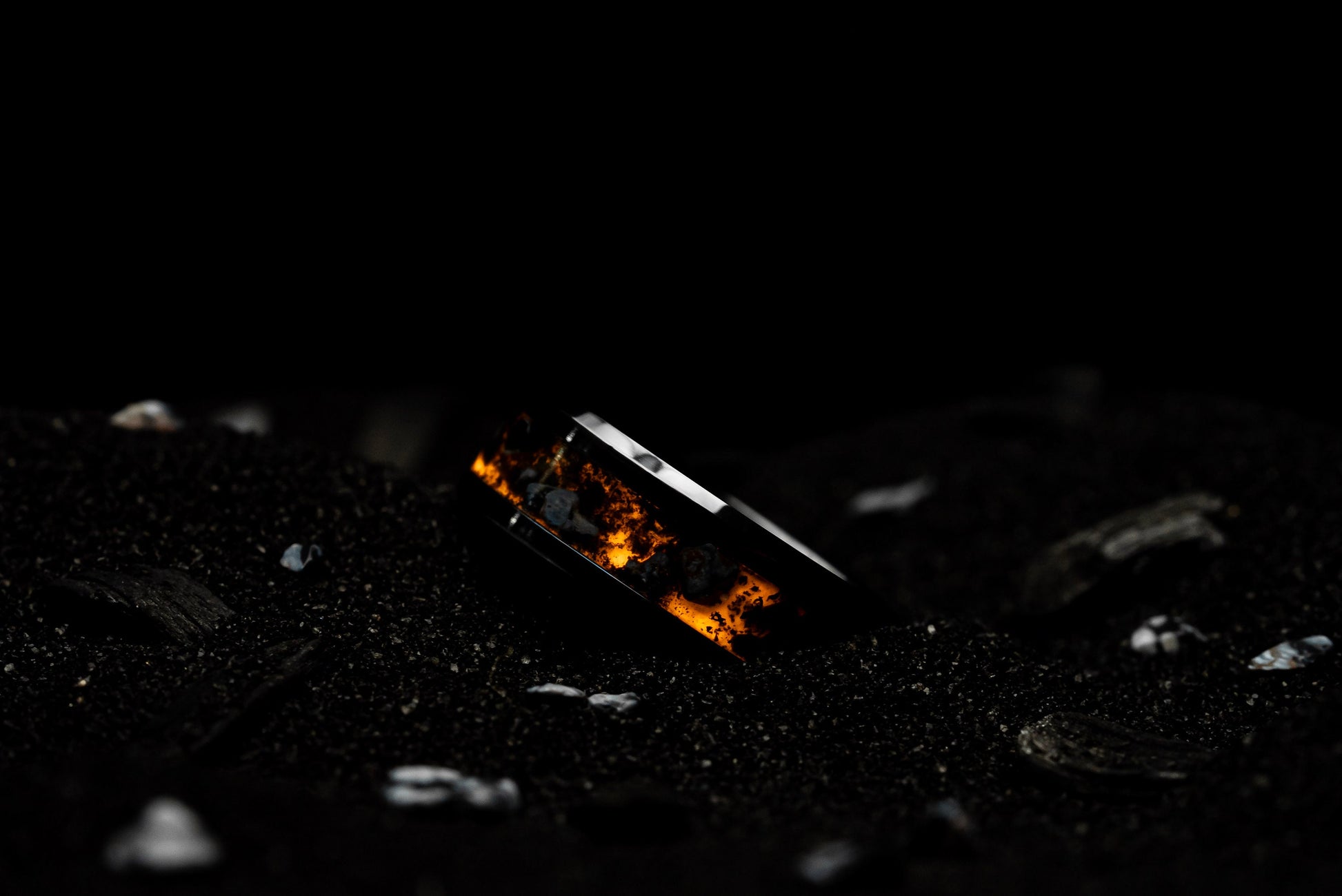 Smoldering Snow | Snowflake Obsidian and Crushed Icelandic Lava with Orange/Red Glow.